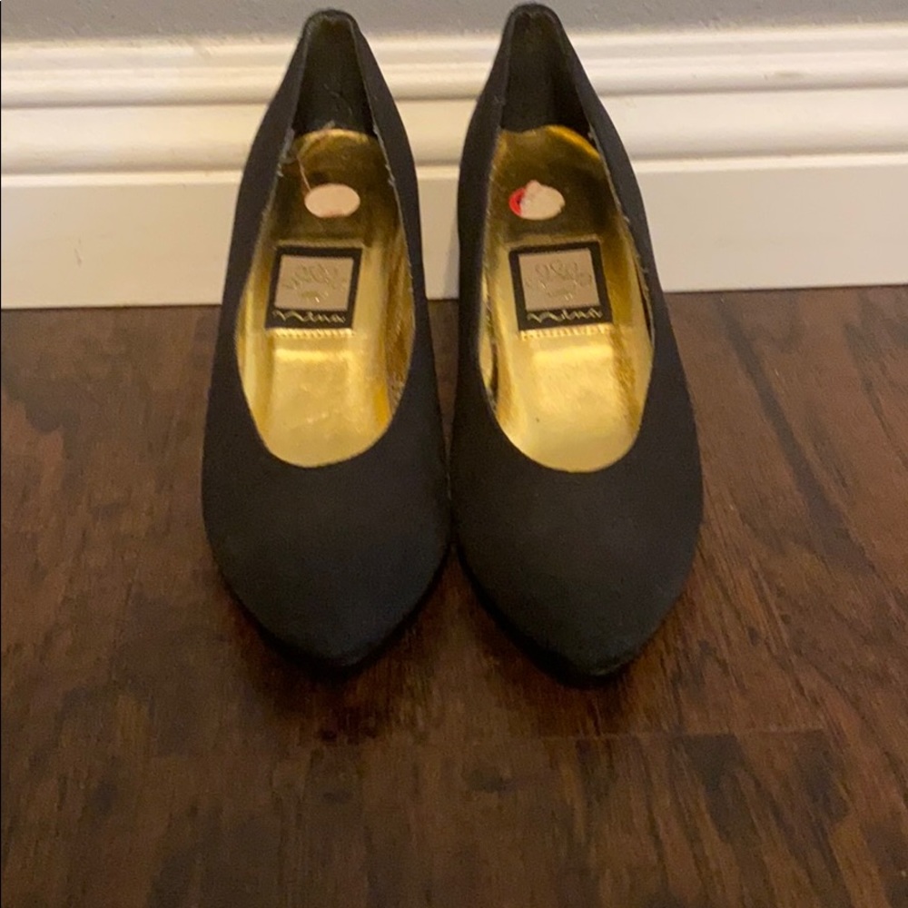 Black dress shoes with a slight heel